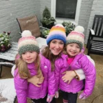 Photo of Dr. Lewis' wife and her daughters