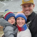 Photo of Dr. Lewis with his wife and son