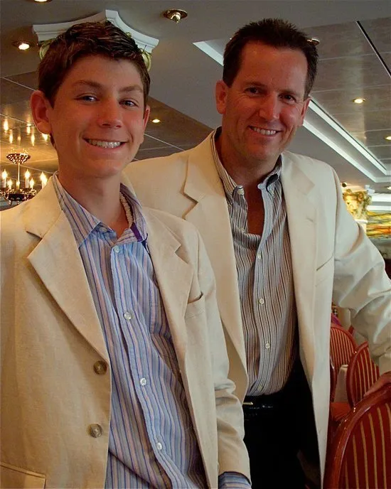 Dr. Grimes and his son in suits