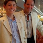 Dr. Grimes and his son in suits
