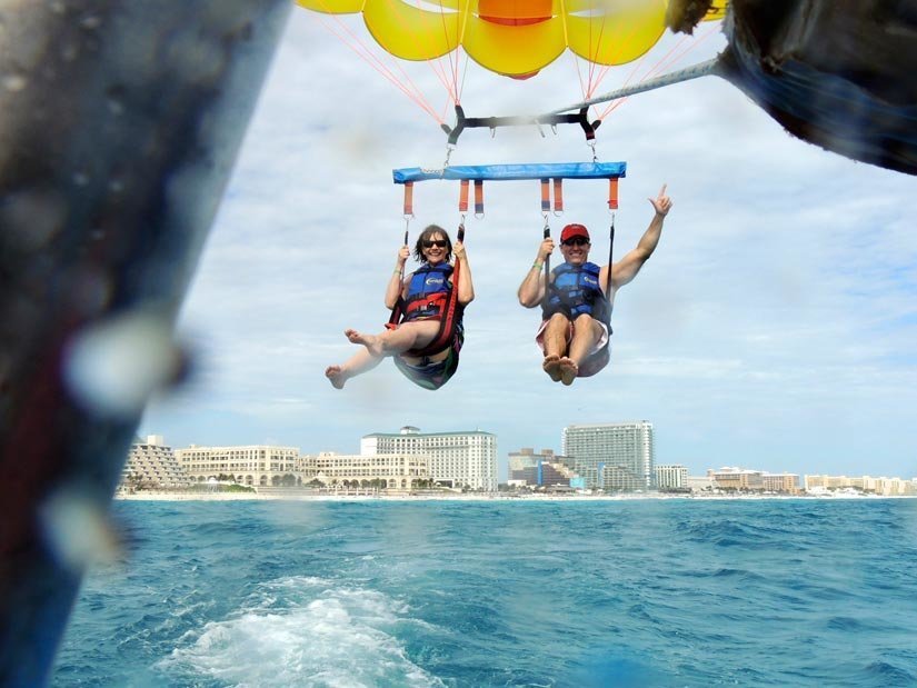 Dr. Grimes and a staff member parasailing