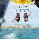 Dr. Grimes and a staff member parasailing